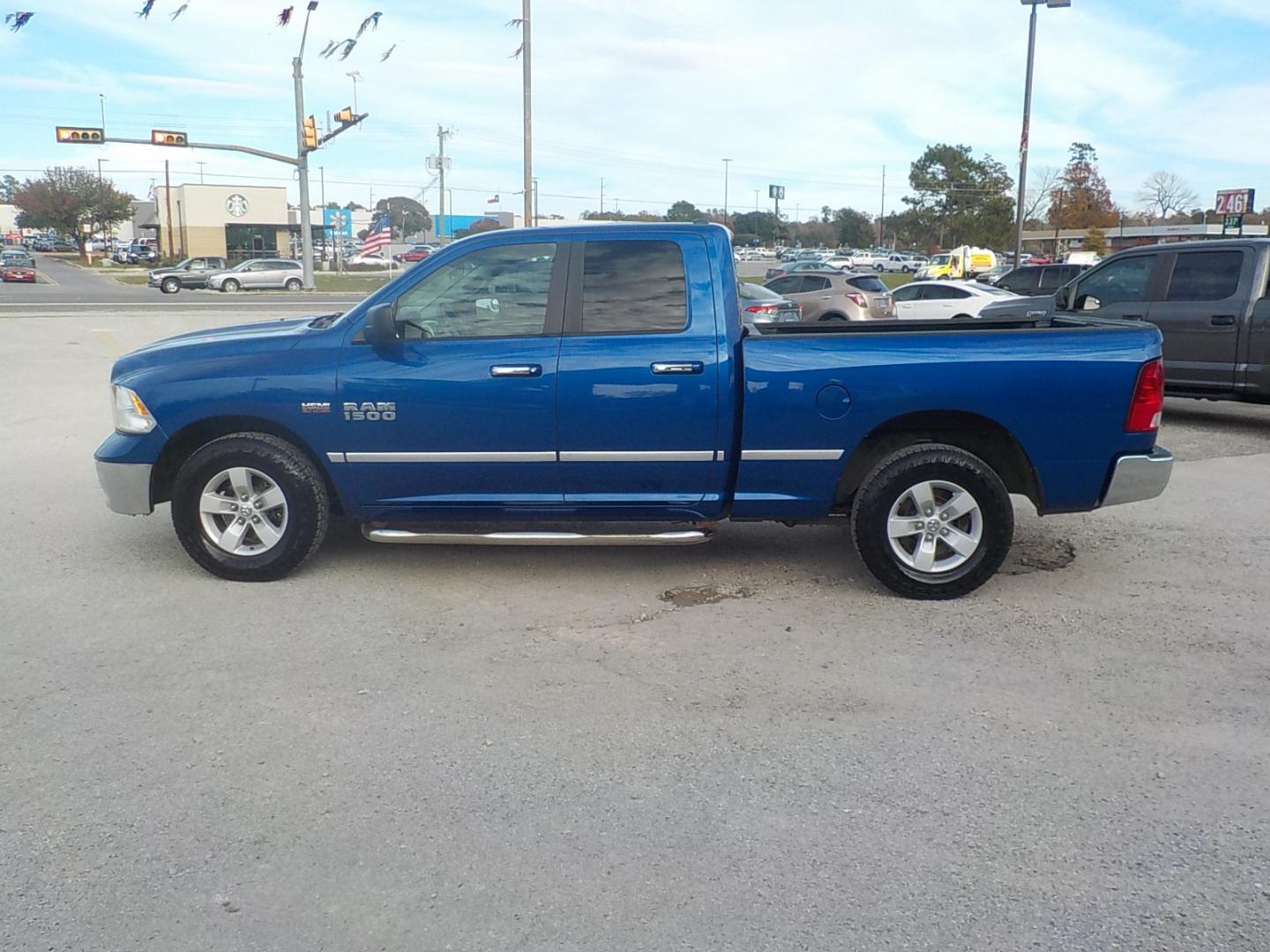 2016 Blue RAM 1500 SLT Quad Cab 2WD (1C6RR6GT0GS) with an 5.7L V8 OHV 16V engine, 6A transmission, located at 1617 W Church Street, Livingston, TX, 77351, (936) 327-3600, 30.710995, -94.951157 - Nice clean truck for under 20K. If you come look at it you'll buy it! - Photo#4